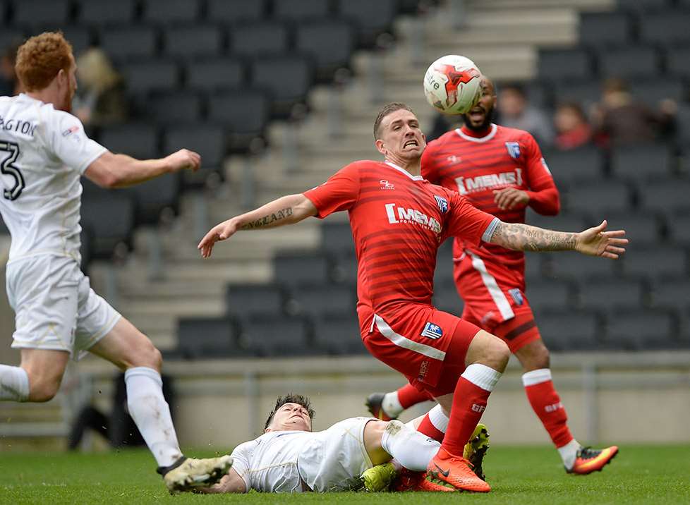 Cody McDonald is fouled as the Gills win a penalty Picture: Ady Kerry