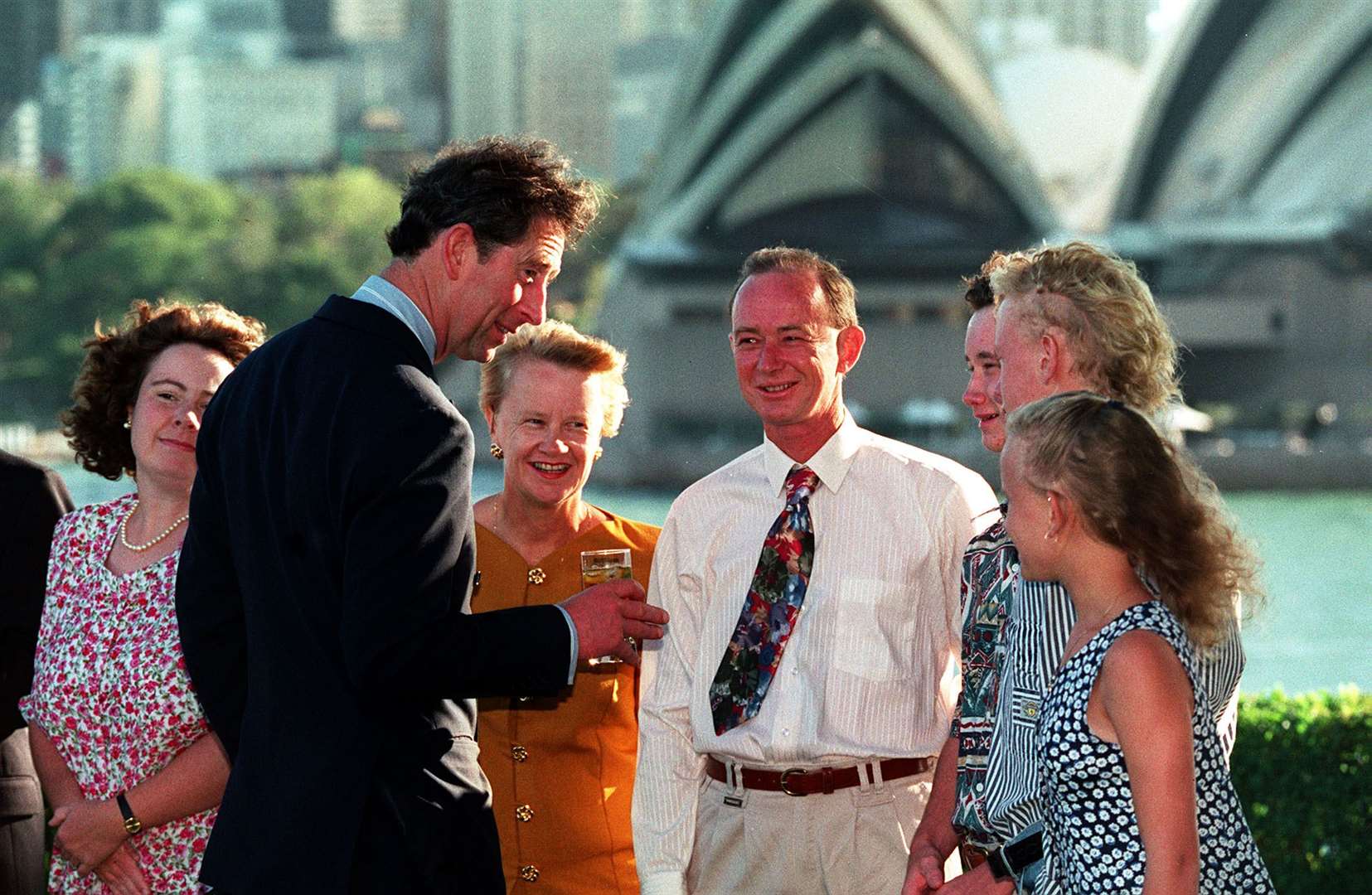 The prince chats to people in Sydney the day after a security scare in 1994 (Martin Keene/PA)