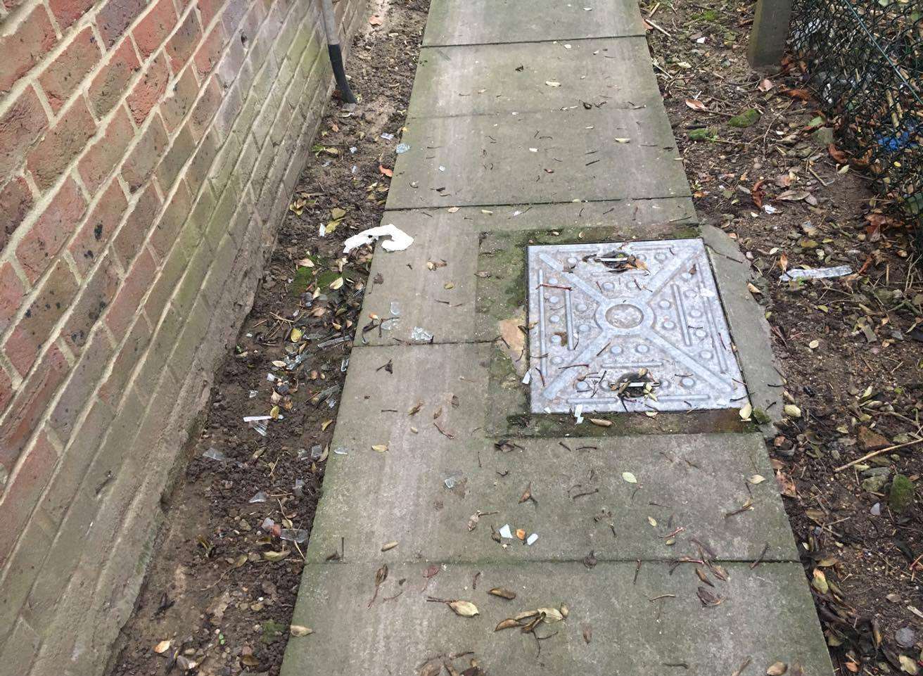 Glass on the floor outside Mr Allen's property