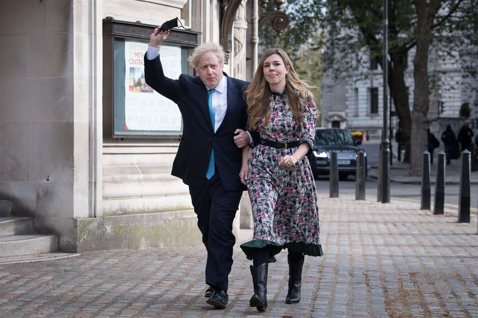 Prime Minister Boris Johnson and his then fiancee Carrie Symonds arrive to cast their vote during local elections in May (Stefan Rousseau/PA)