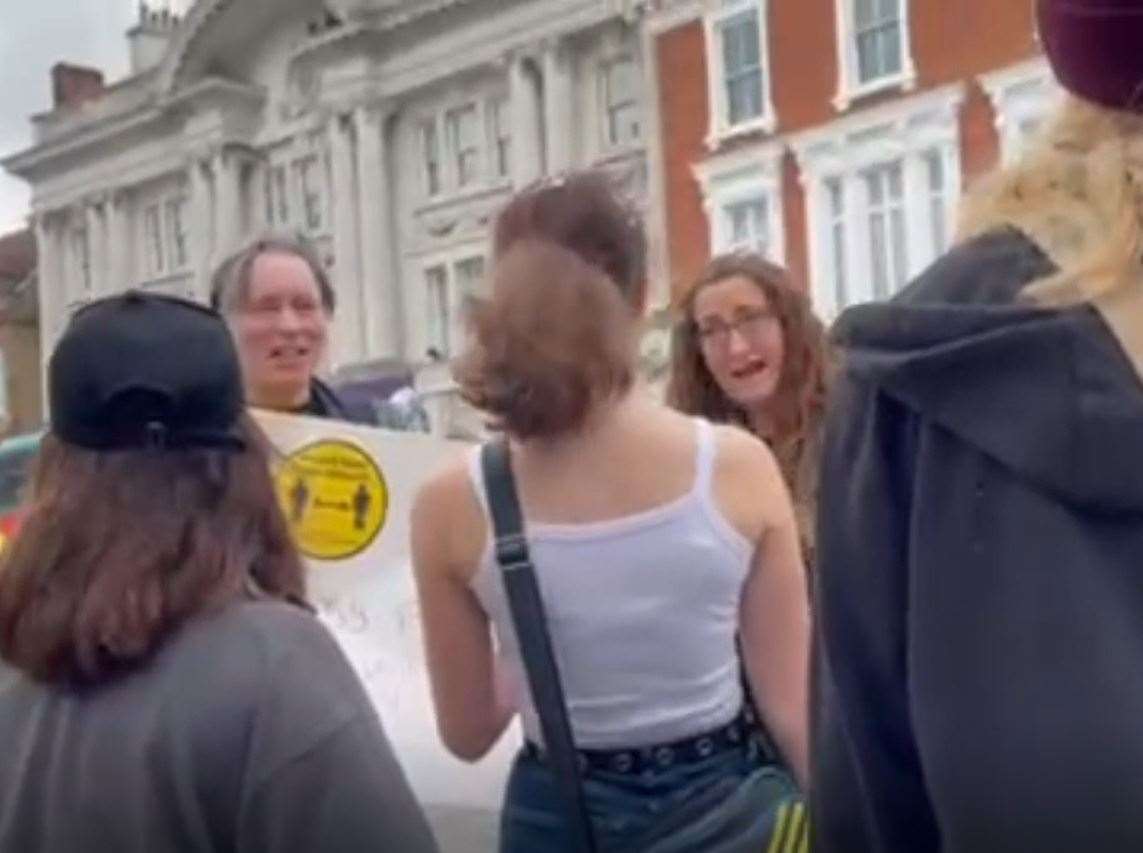 A heated exchange during the protests on Saturday. Picture: Louis Hayward