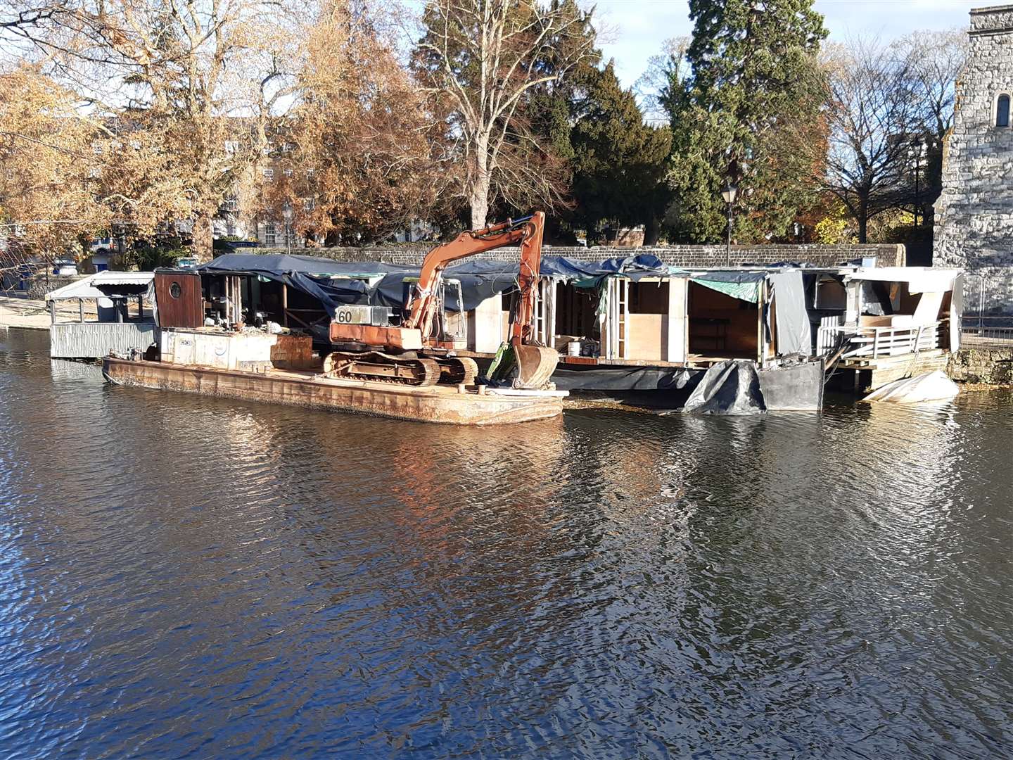 Work begins to tow away the Embankments bar and restaurant barge in Maidstone