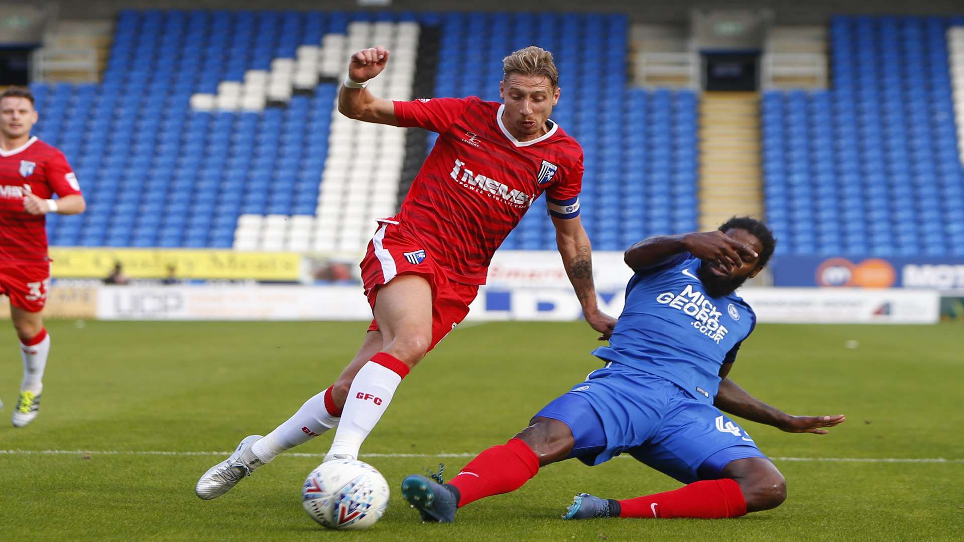 Lee Martin up against Peterborough back in October Picture: Andy Jones