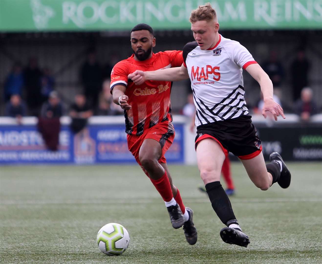 Defender Alex Green drives forward for Deal Town before he was sent off in the second half. Picture: Paul Willmott