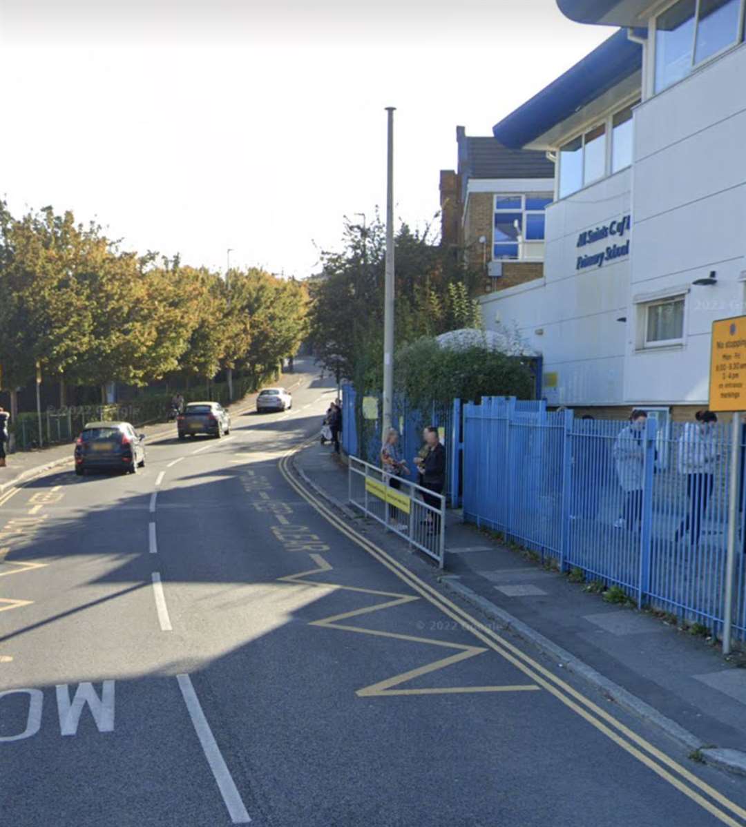 The busy road outside All Saints C of E Primary School in Magpie Hall Road, Chatham