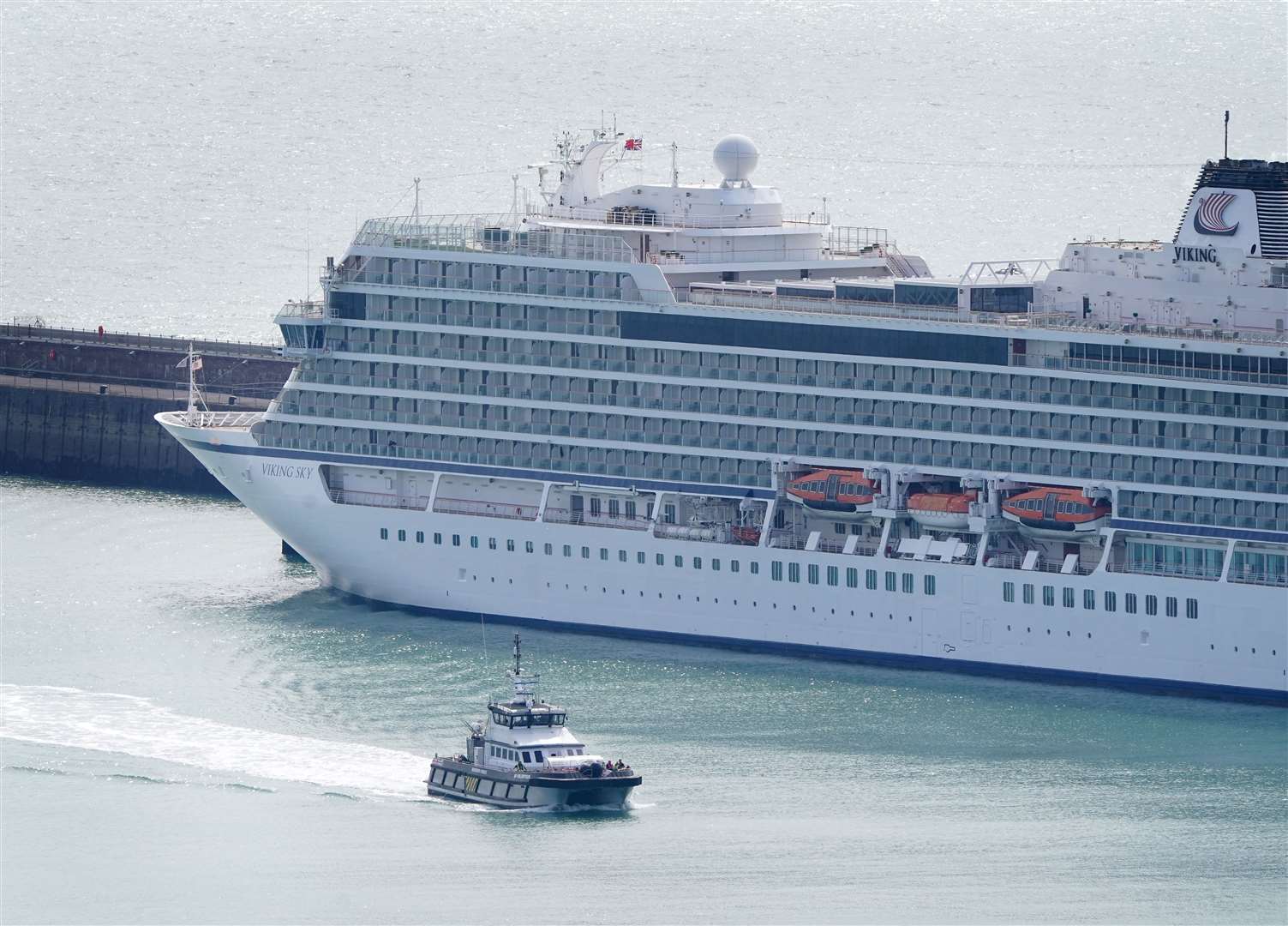 A Border Force boat passes a cruise liner docked at Dover (Gareth Fuller/PA)