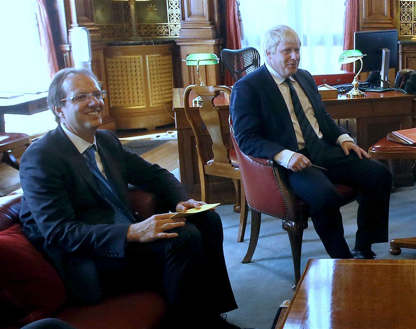 Prime Minister Boris Johnson with his principal private secretary, Martin Reynolds (left), who sent an email to more than 100 Downing Street employees asking them to “bring your own booze” for an evening gathering (Kirsty Wigglesworth/PA)