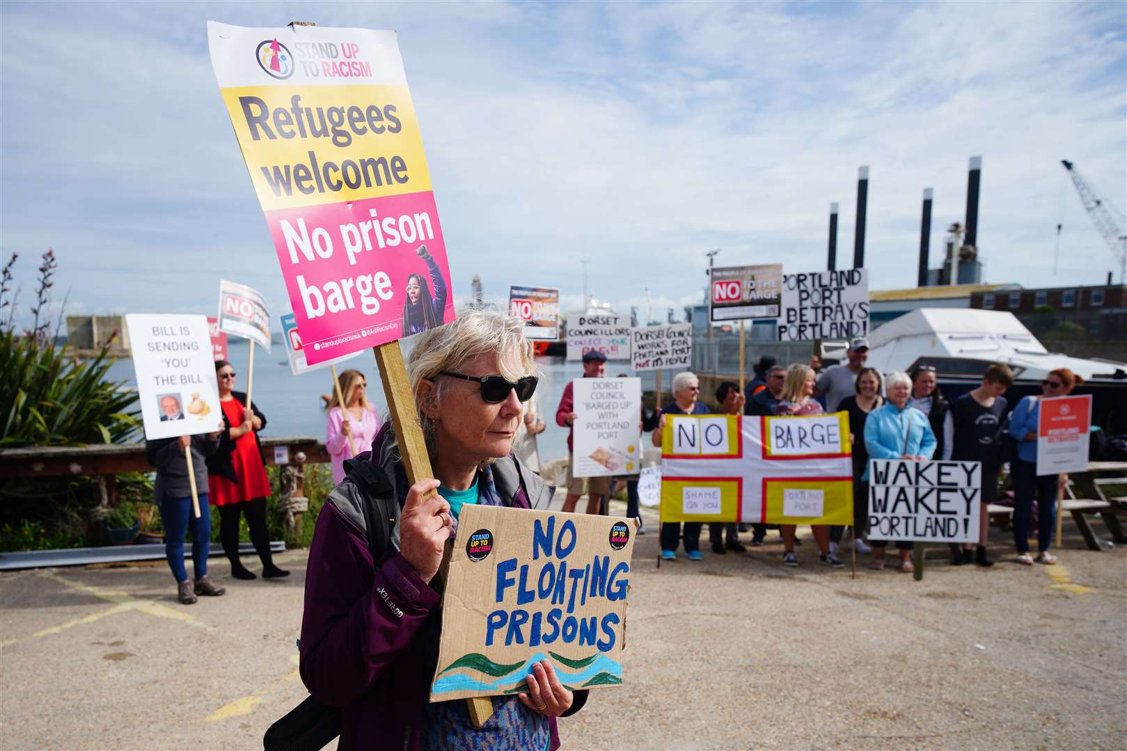 Protesters in Portland in after the arrival of the Bibby Stockholm (Ben Birchall/PA)