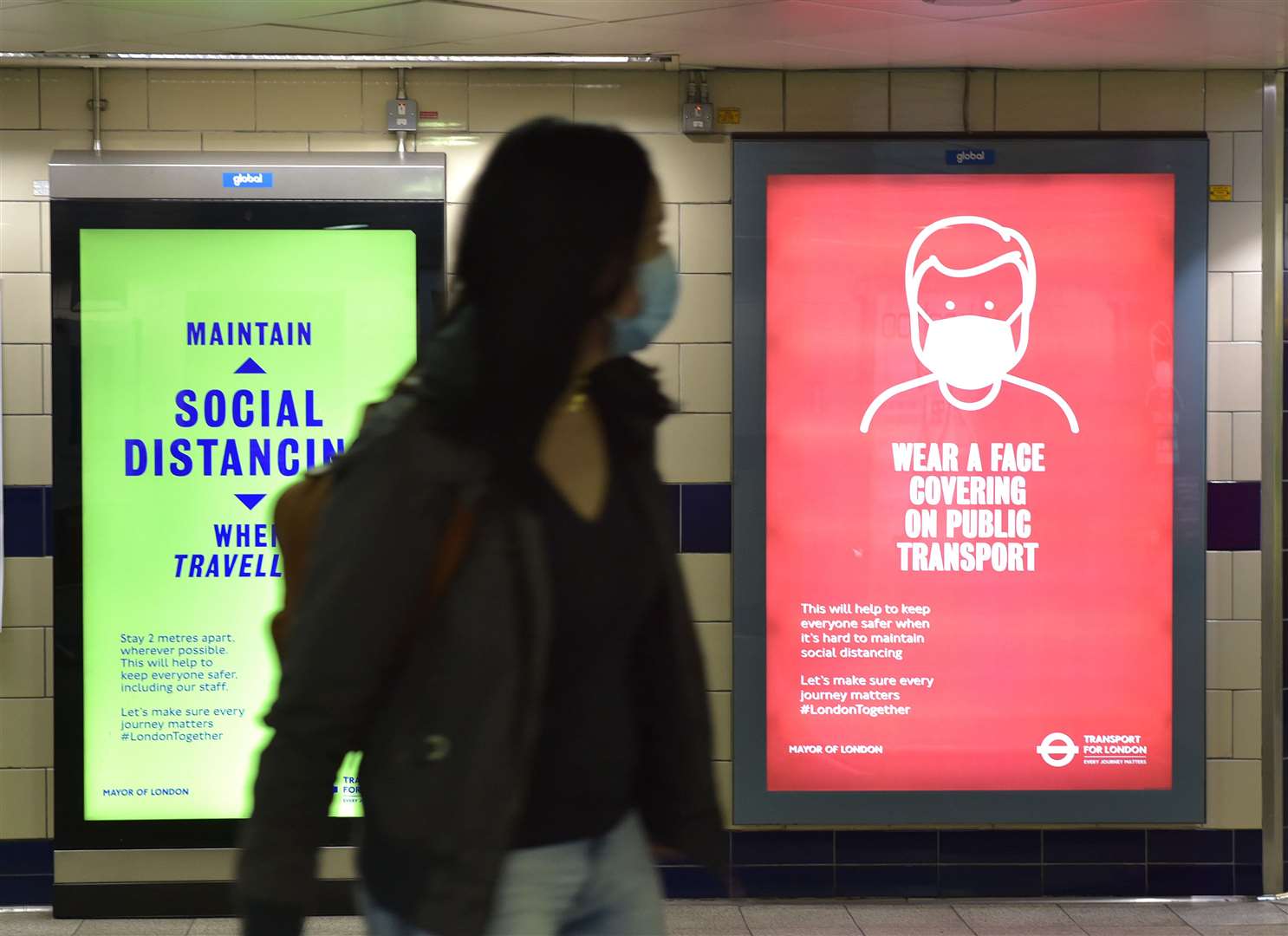 Coverings have been mandatory on public transport since June (Nick Ansell/PA)