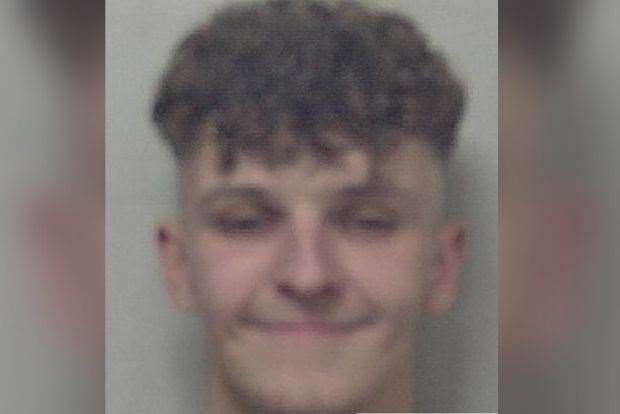 Shameless Aiden Stewart-Hubbard smiles in his police mugshot Pic: Kent Police