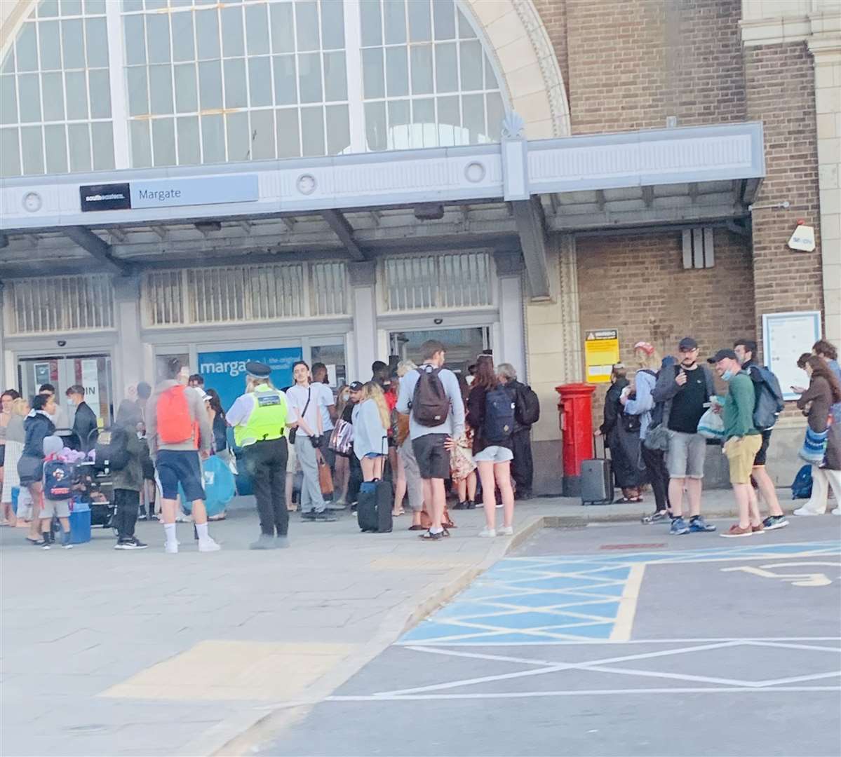 Dozens of people were forced to wait outside the station