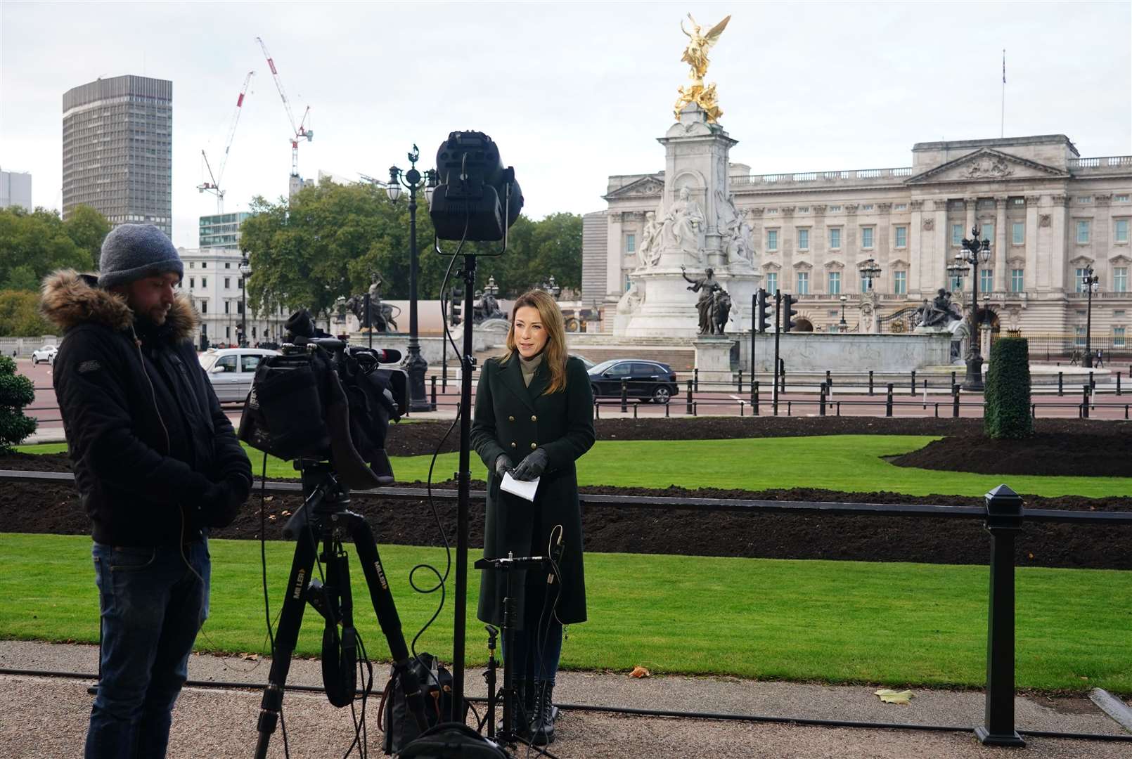 A TV news crew outside Buckingham Palace after the Queen returned to Windsor Castle (Dominic Lipinski/PA)