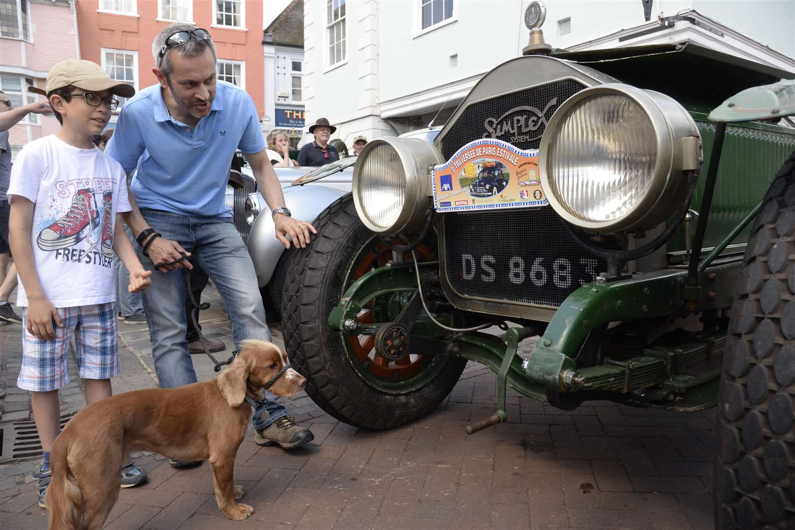 Alec Tucker, dad Mark and their dog admire this vintage vehicle and right, John Lifton and grandfather Andy Gibbs with their 1968 J Type Bedforfd truck,