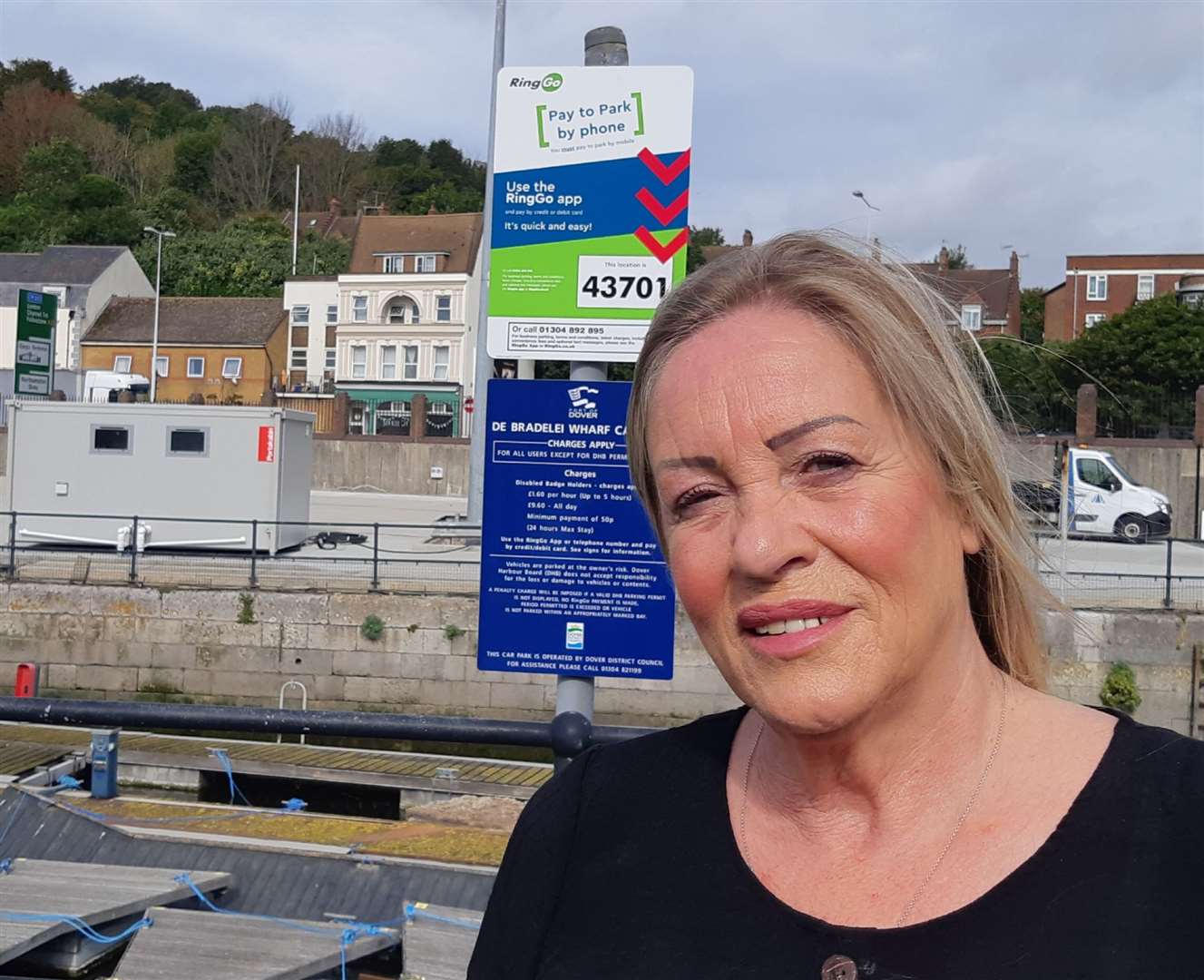 Centre manager Sally-Anne Vokes, next to a sign showing the new system. Picture: Sam Lennon KMG