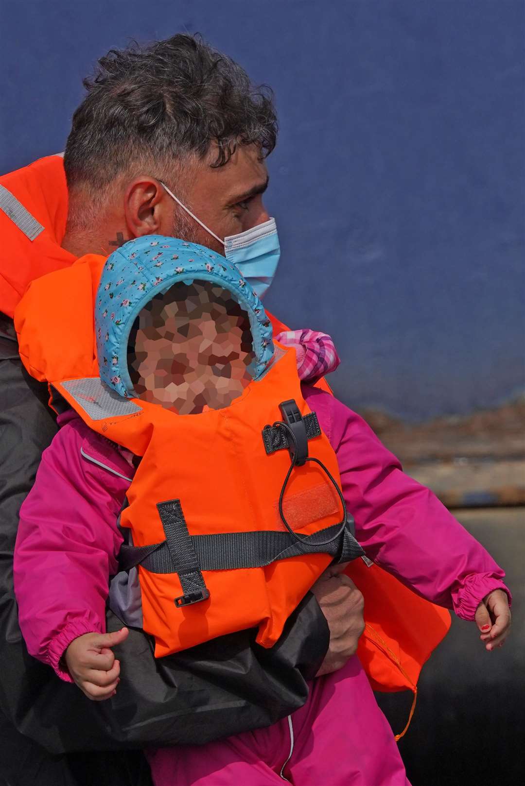 A young child was amongst a group of people arriving in Dover (Gareth Fuller/PA)