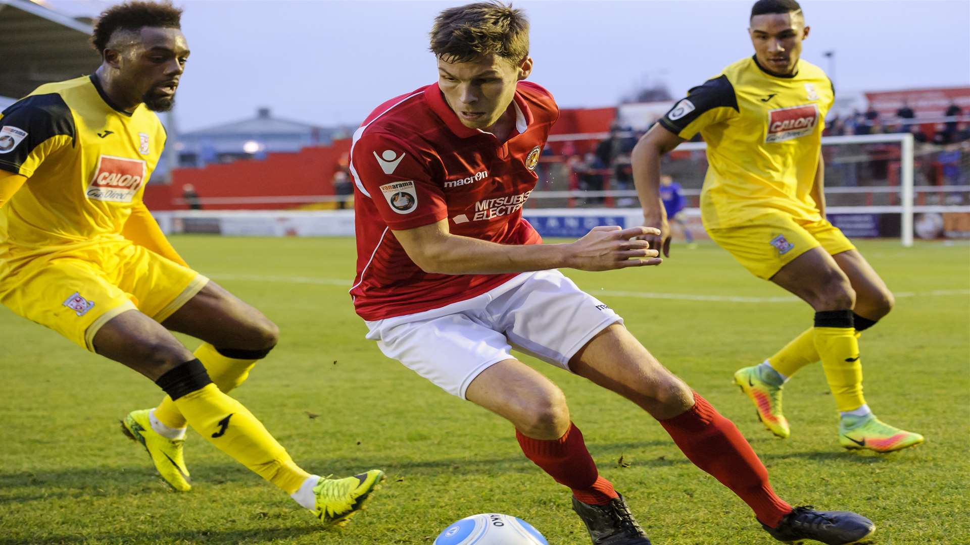 Charlie Sheringham twists and turns looking for a through the Woking defence Picture: Andy Payton