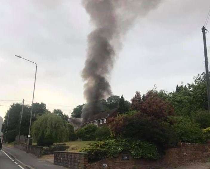 Smoke billowing from a house in Maidstone Road, Borough Green