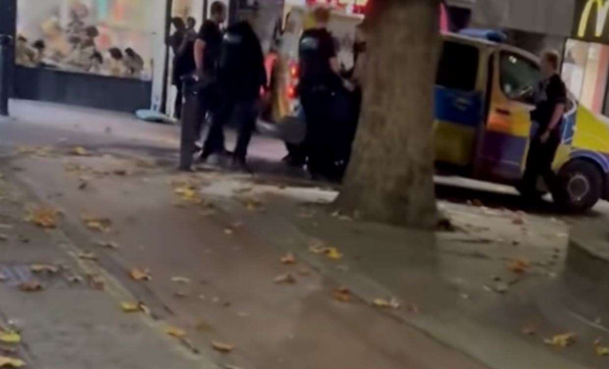 Several police officers were spotted outside McDonald's in Ashford town centre last night