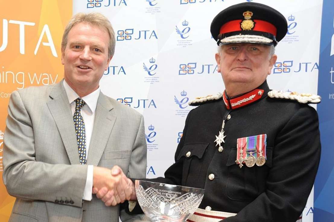 The Lord Lieutenant of Kent, Viscount De L'Isle, MBE, presenting Jon Tibbs, left, of communications agency JTA with the Queen's Award for Enterprise in International Trade
