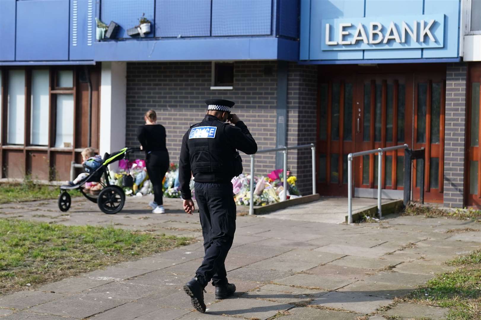 Police officers at Leabank in Luton (Jacob King/PA)