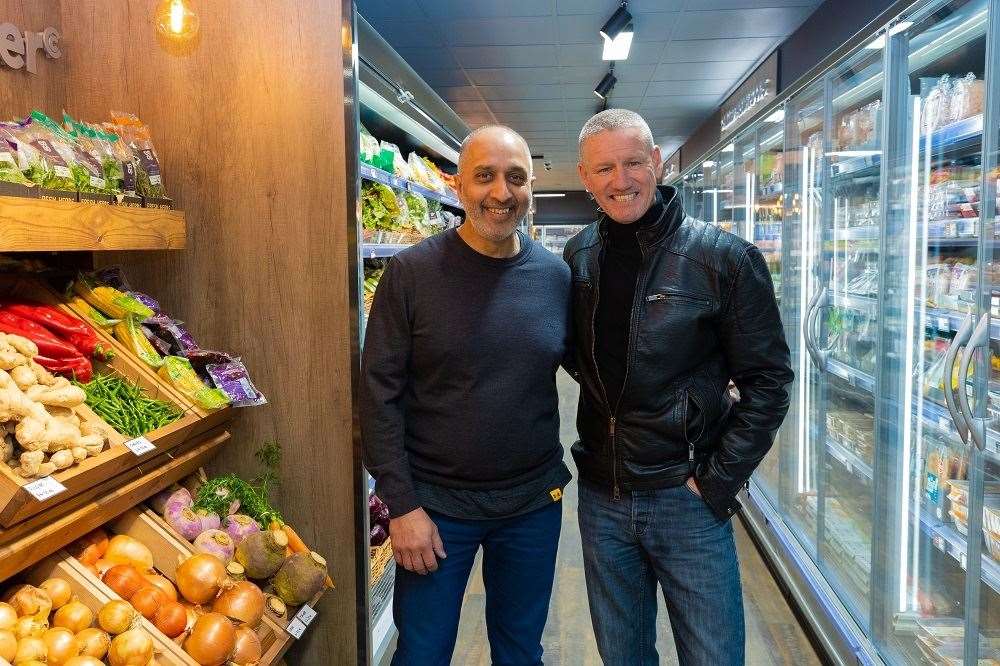 From left: Peter Juty and SAS star Mark Billingham who re-opened the store after a major refit