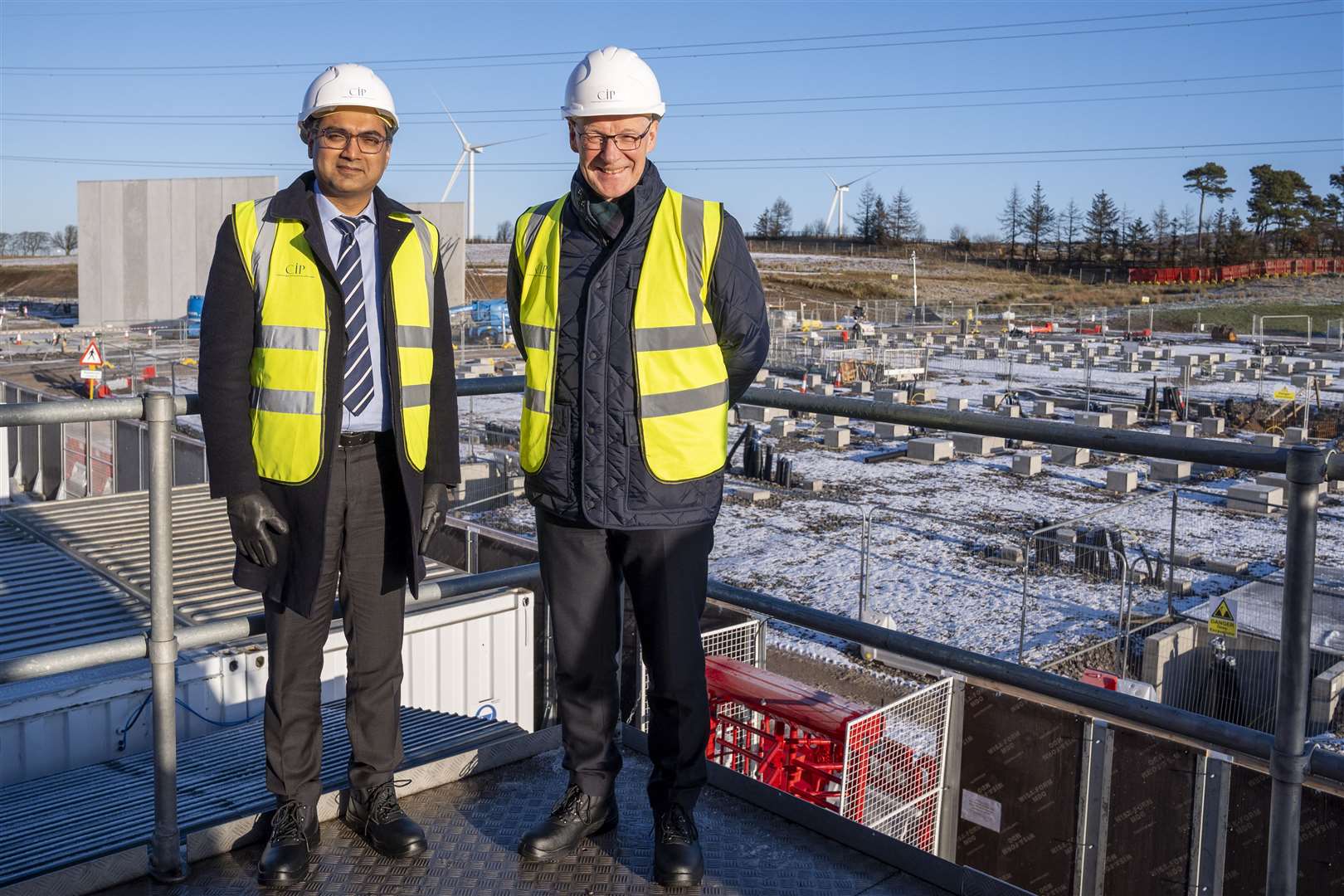 First Minister John Swinney, right, with CIP partner Nischal Agarwal at the Coalburn 1 facility (Jane Barlow/PA)