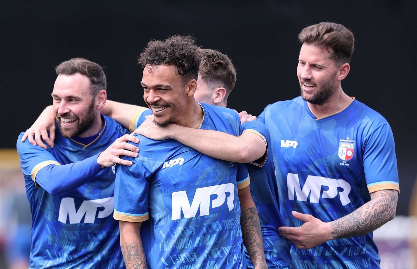 Market Hotel wearing MPR sports kit at Maidstone’s Gallagher Stadium, with James Rogers far right. Picture: PSP Images