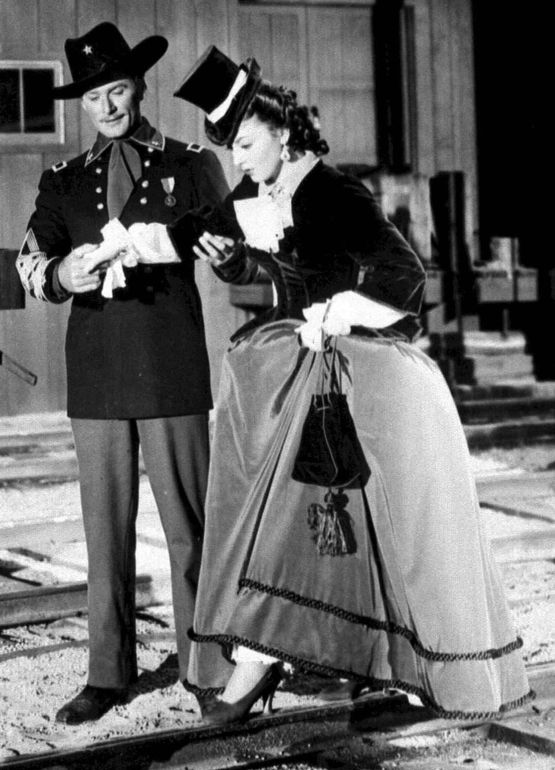 De Havilland and Errol Flynn in They Died With Their Boots On in 1941 (PA)