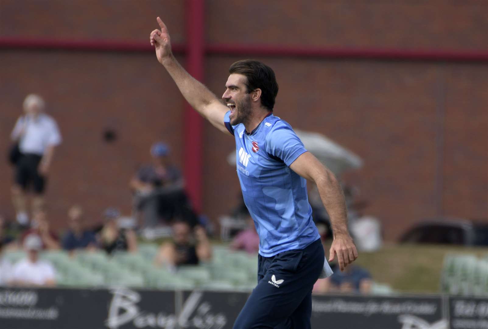 Kent's Grant Stewart celebrates taking the opening wicket of the game, Luke Wells for no score. The Italian international later scored 49 with the bat in 43 balls. Picture: Barry Goodwin