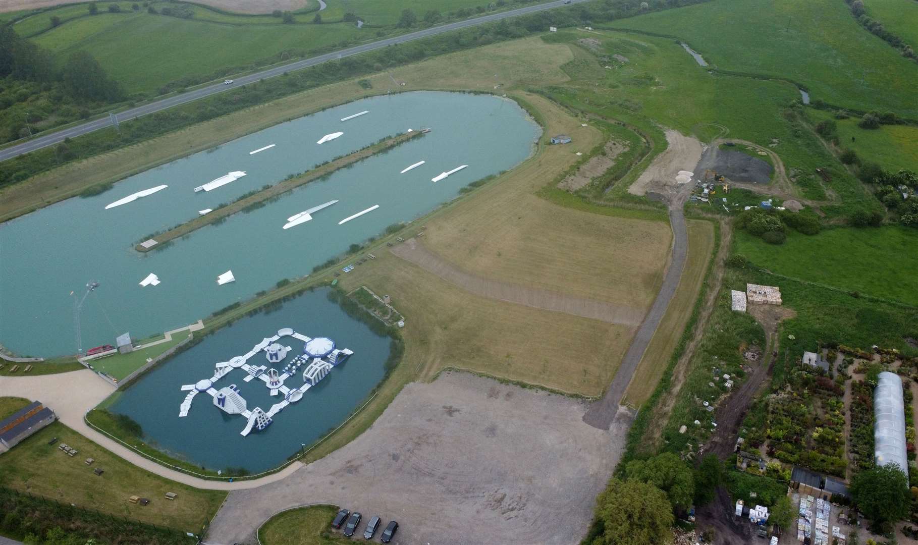 Whitemills Wake and Aqua Park in Sandwich has secured permission for a new artificial lake, which will be located on the field in the centre of this aerial image. Picture: Barry Goodwin