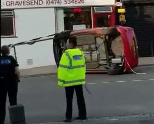 A red car overturned in Northfleet Hill earlier today. Picture: Michael Babington (11745967)