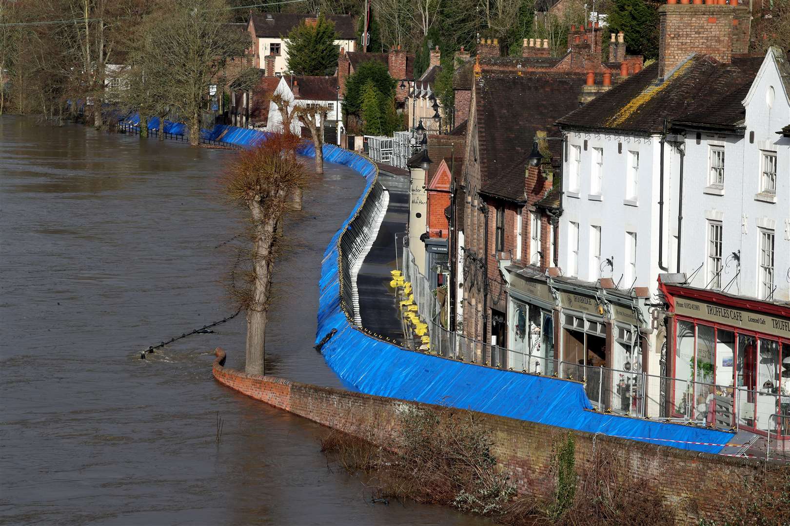 Flood defences along the Wharfage next to the River Severn following high winds and wet weather in Ironbridge, Shropshire (Nick Potts/PA)