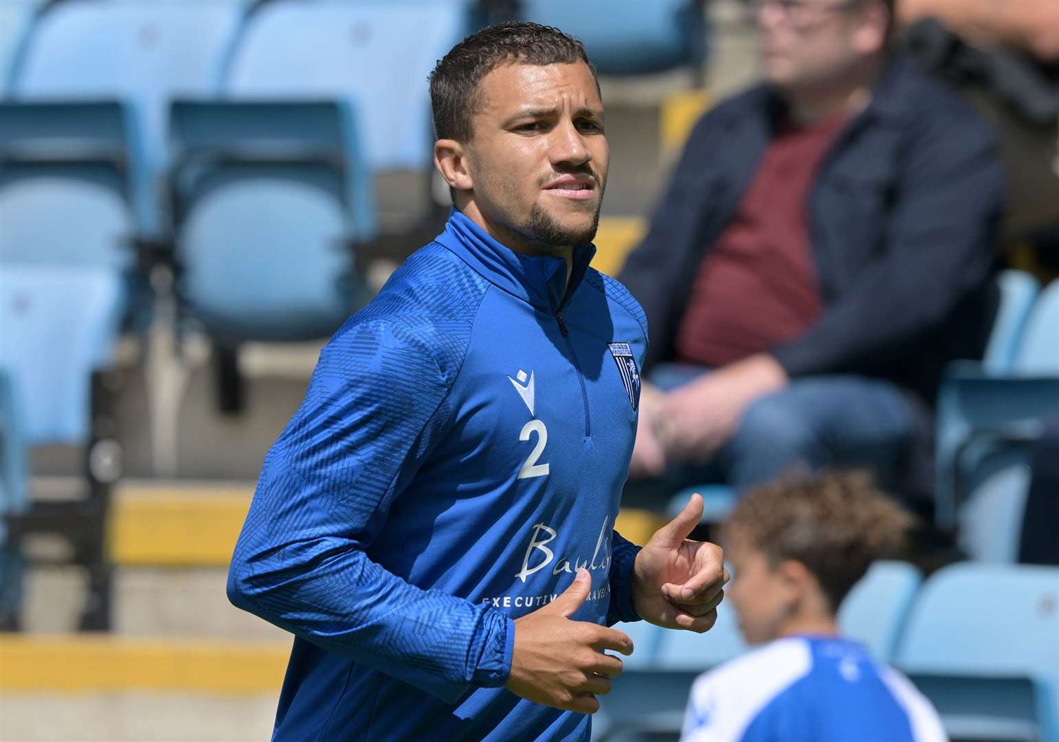 Cheye Alexander warming up ahead of Gillingham’s friendly against Millwall. Picture: Keith Gillard