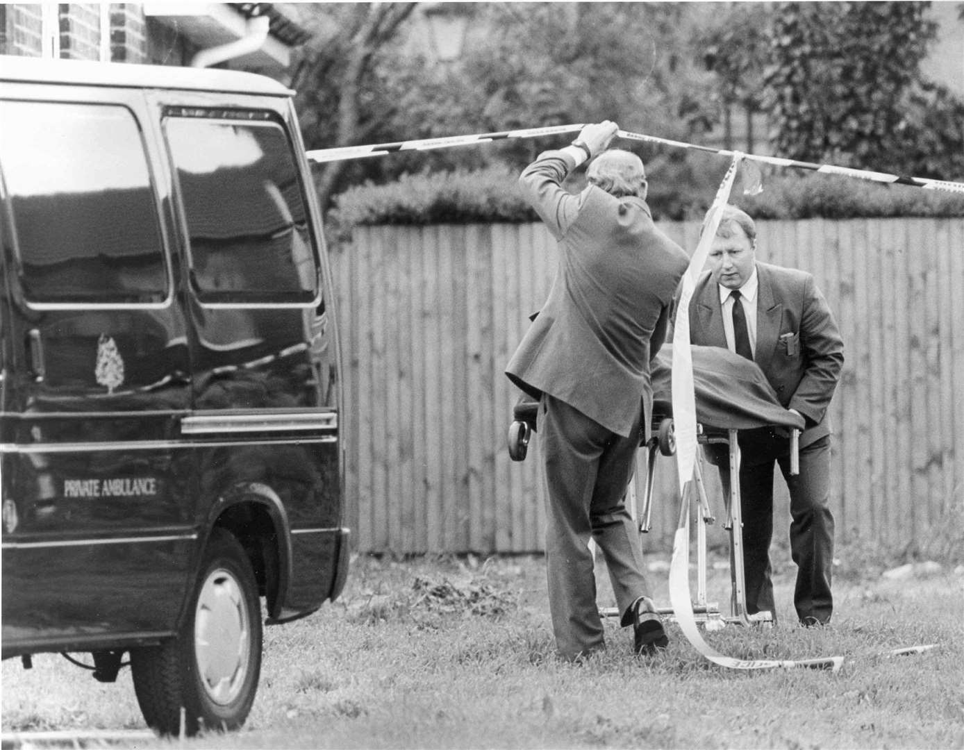 Glenda's body, covered by a blanket, is taken away from the United Reform Church in Crow Lane, Rochester