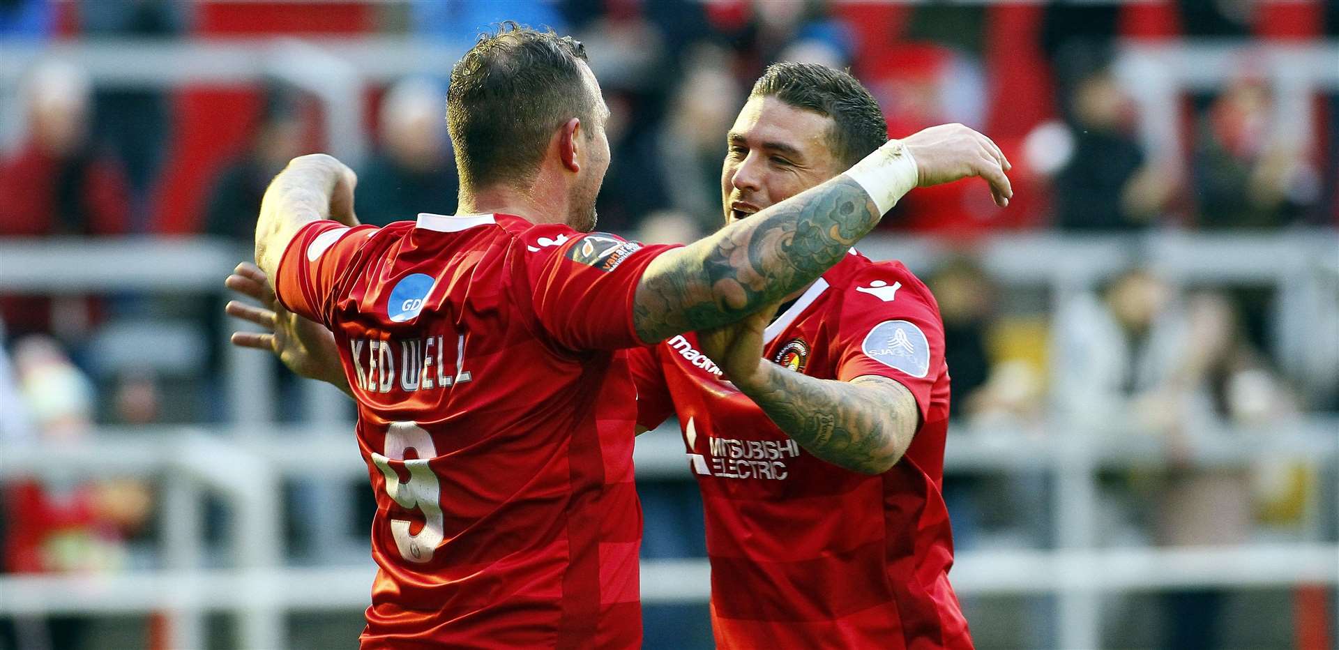 Danny Kedwell with his former Gills team-mate Cody McDonald Picture: Sean Aidan