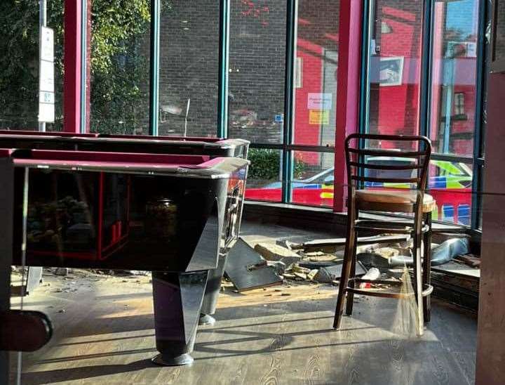 Inside the bowling alley after the car hit the building. Picture: Shola Saunter