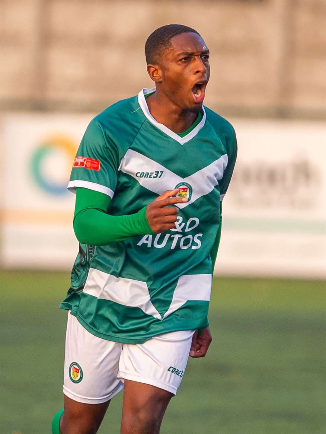 Lanre Azeez celebrates his goal as Ashford take a 2-0 lead. Picture: Ian Scammell