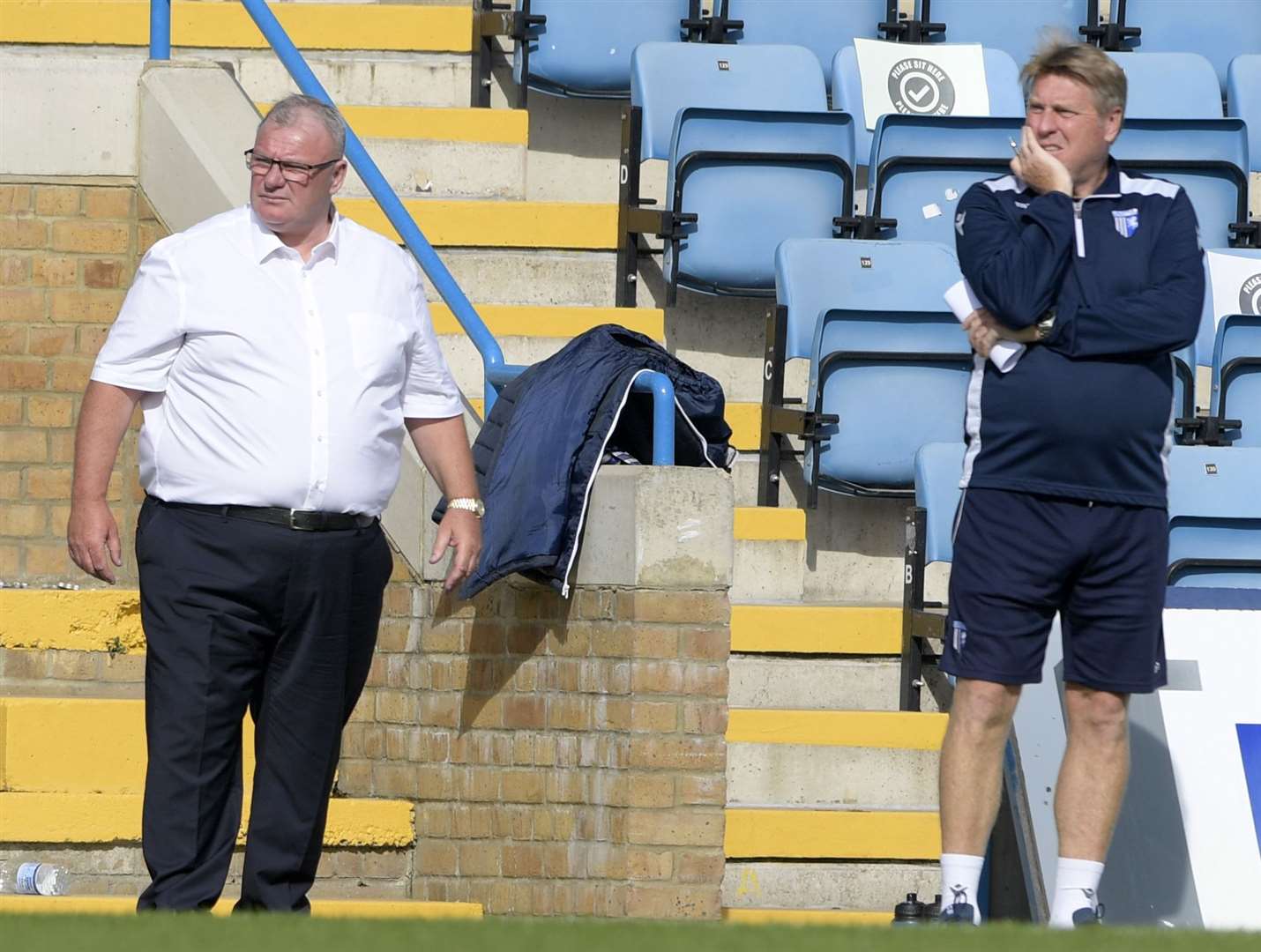 Gillingham manager Steve Evans and assistant Paul Raynor watch their team take on Hull City at the weekend Picture: Barry Goodwin