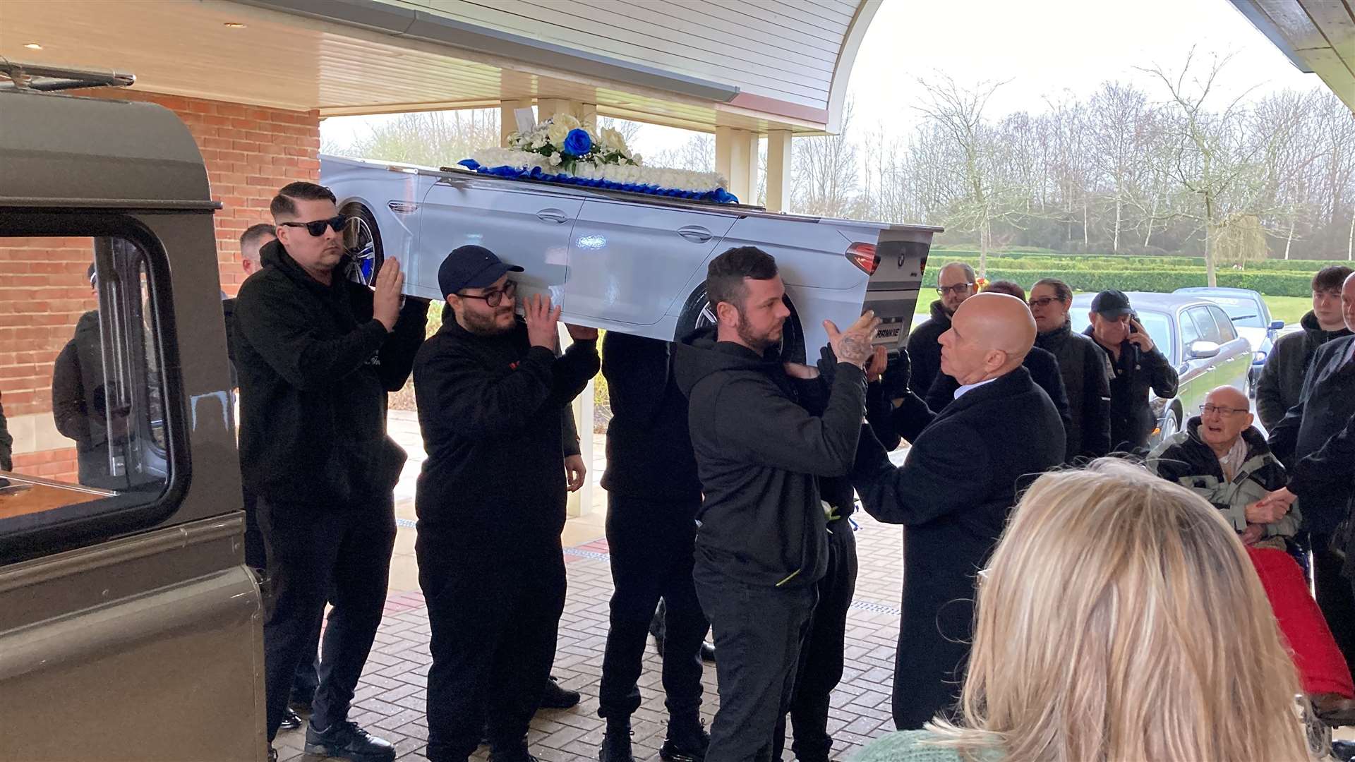 The car-shaped coffin was carried into the chapel at the Garden of England crematorium, Bobbing, for Frankie Wright's funeral