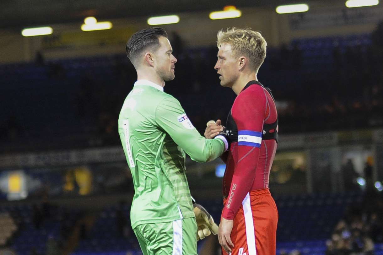 Keeper Stuart Nelson and skipper Josh Wright celebrate a vital point at full time Picture: Ady Kerry