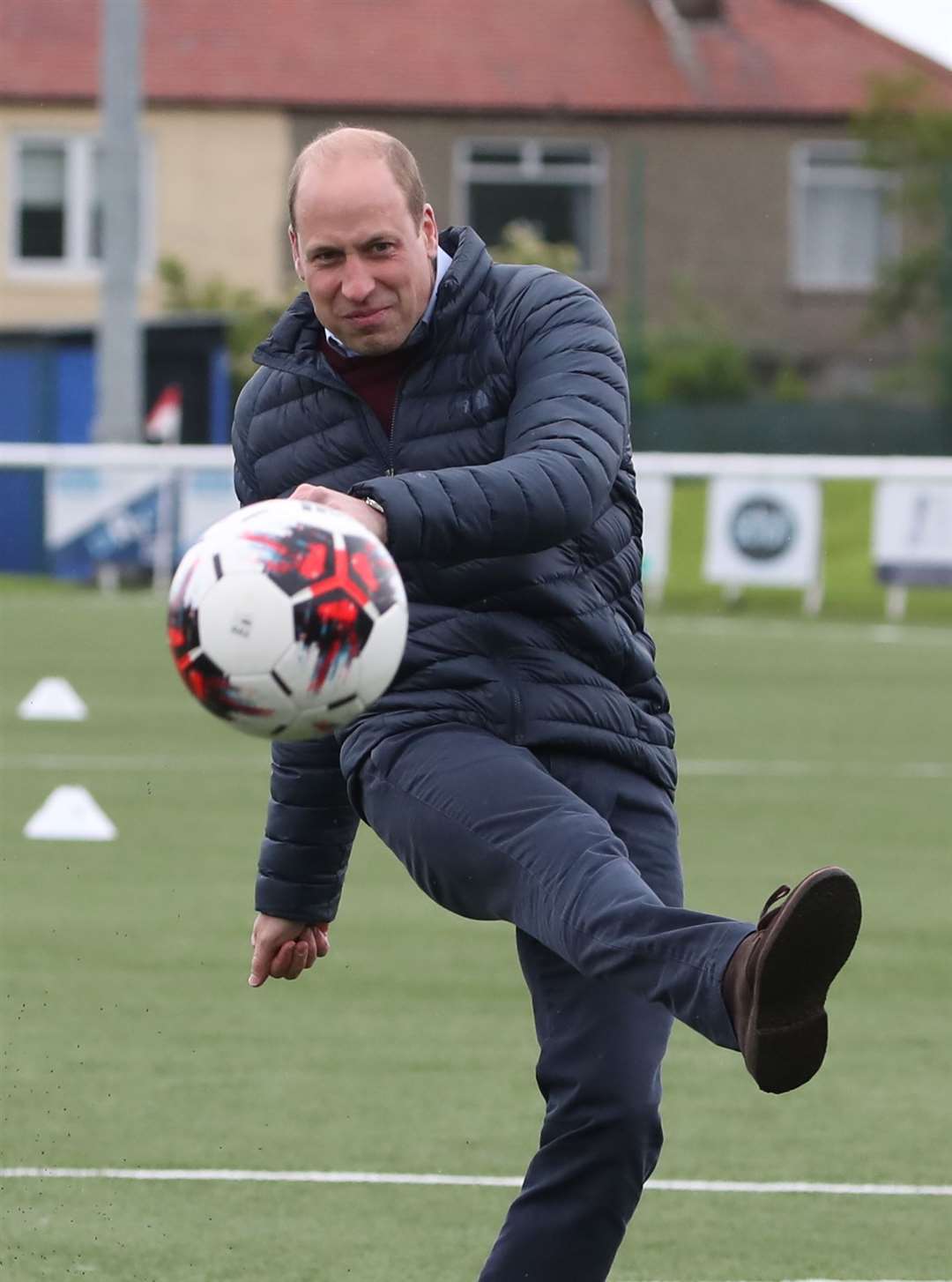 William shows off his football skills during his visit to Edinburgh (Andrew Milligan/PA)