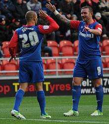 Deon Burton celebrates his opening goal against Rotherham