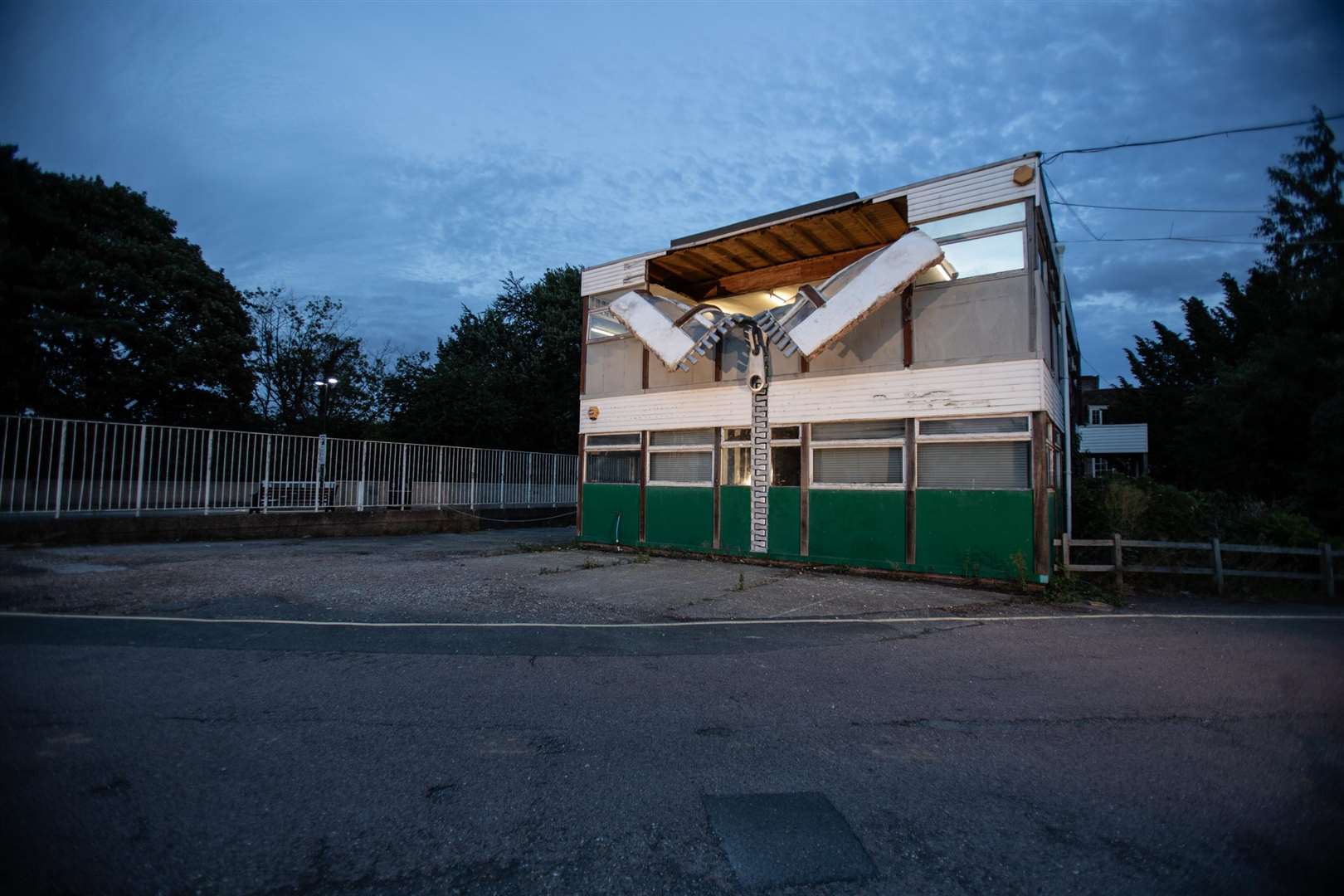 Alex Chinneck's unzipped art installation in Tannery Lane