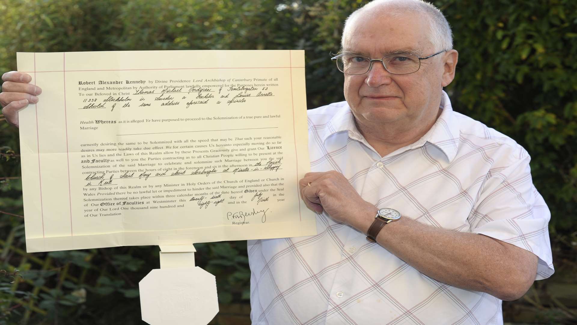 Minster Abbey secretary Andrew Parr with a special marriage licence from 1988