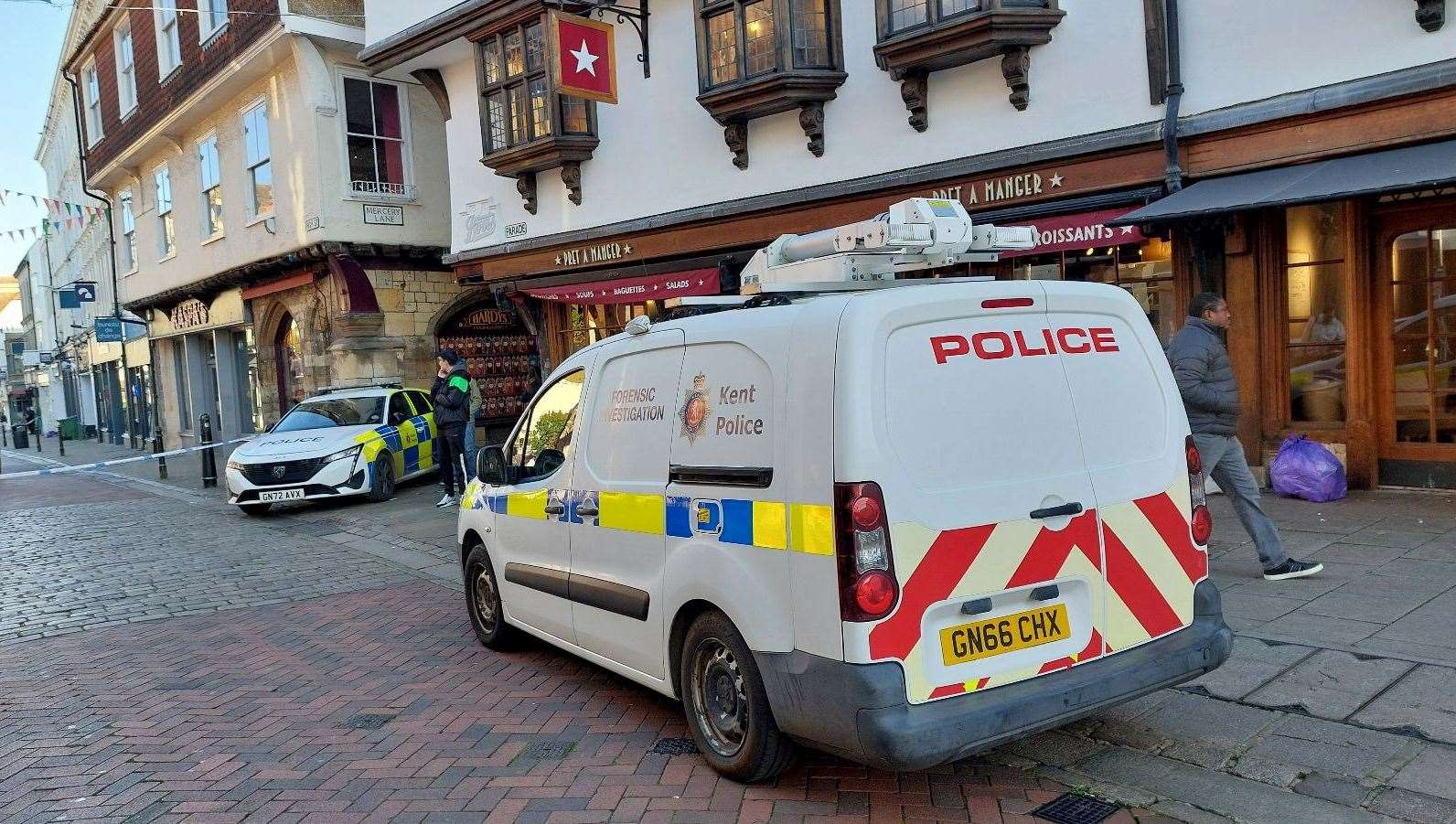 A police cordon remains in place after a man was stabbed to death in Canterbury High Street