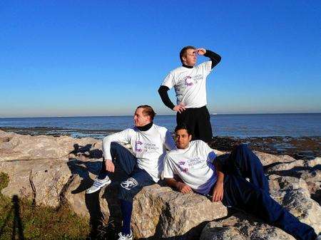 James Kent, standing, Steven Bond, left, and Cymon Williams are hoping to set off on a series of sporting challenges for Cancer Research UK