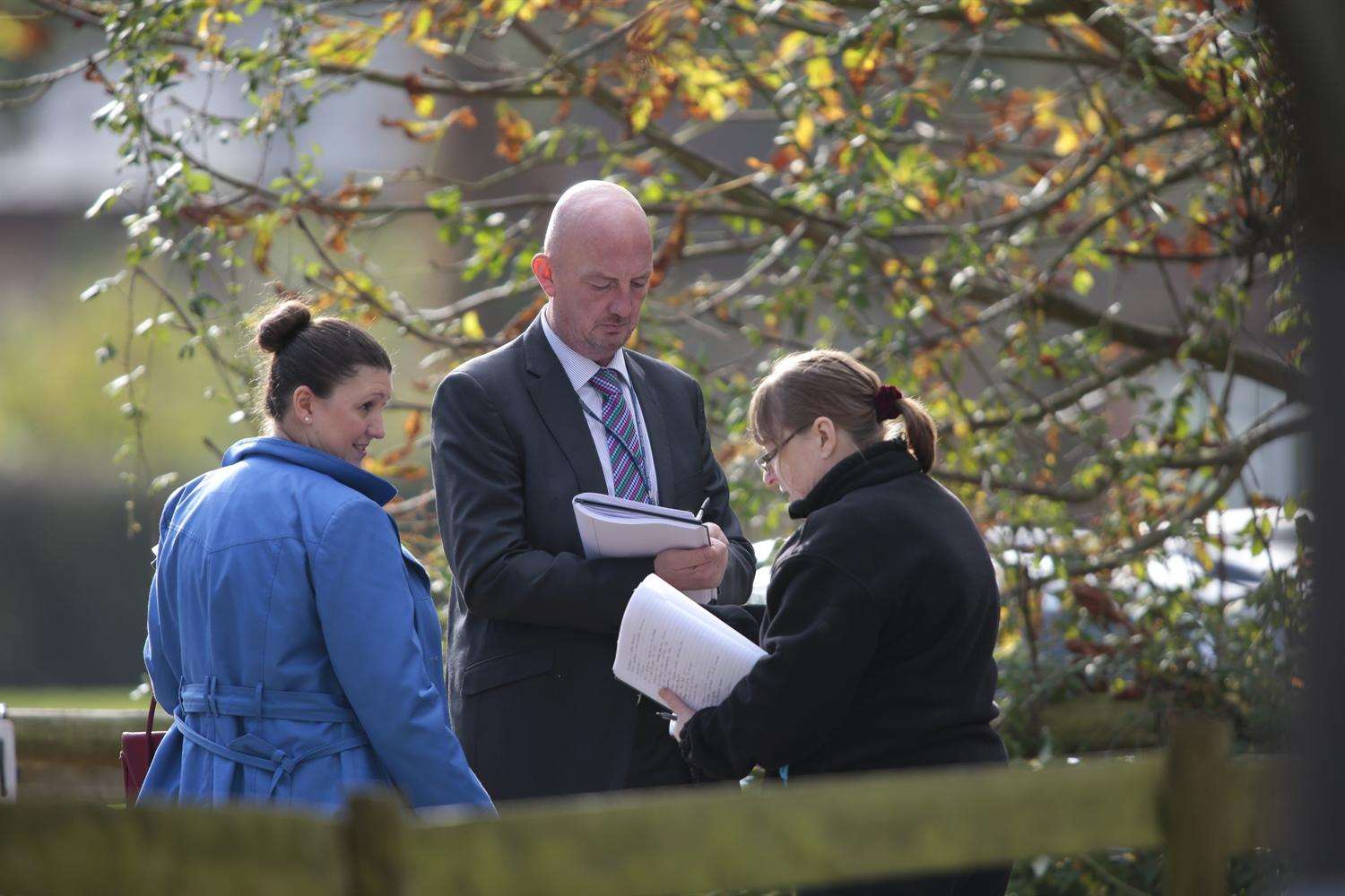 Police in the grounds of St Peter & St Paul in Headcorn. Picture: Martin Apps