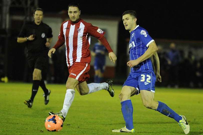 Gillingham's John Mousinho in action against Brackley Picture: Barry Goodwin