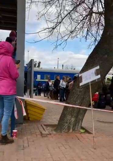 Anxious relatives waiting at Chelm station in Poland