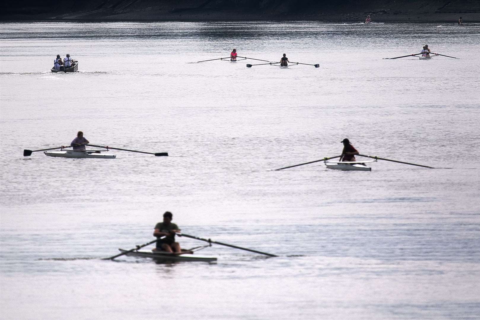 A group of rowers enjoy the hot weather on the River Thames (Victoria Jones/PA)